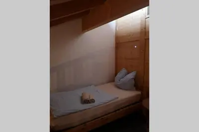 Ein Bett oder Betten in einem Zimmer der Unterkunft 2 Ferienhaus Andermichlhof