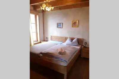 Ein Bett oder Betten in einem Zimmer der Unterkunft 2 Ferienhaus Andermichlhof