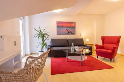 Ein Sitzbereich in der Unterkunft Ferienwohnung Altötting