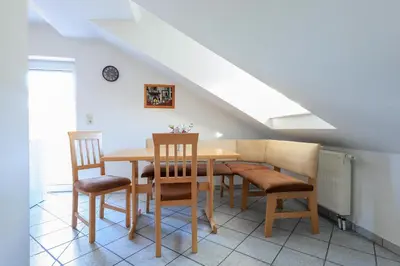 Ein Sitzbereich in der Unterkunft Ferienwohnung Altötting