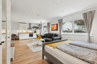 Ein Bett oder Betten in einem Zimmer der Unterkunft FeWo Himbeerweg