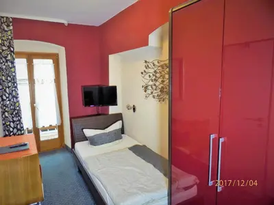 Ein Bett oder Betten in einem Zimmer der Unterkunft Hotel Leonhardihof