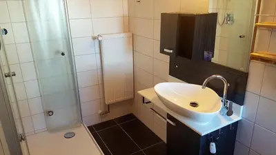 Ein Badezimmer in der Unterkunft Hotel Leonhardihof