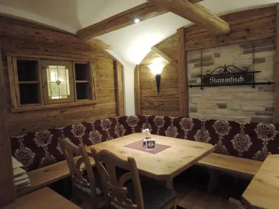Ein Sitzbereich in der Unterkunft Gasthof Stocker