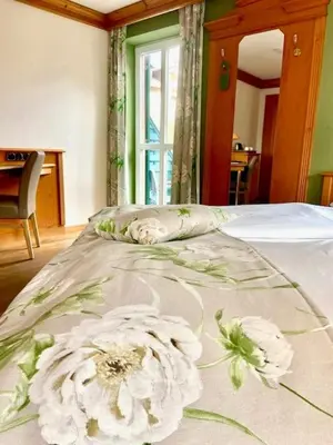Ein Bett oder Betten in einem Zimmer der Unterkunft Hotel Fischerhaus