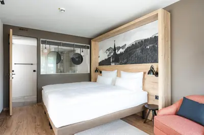 Ein Bett oder Betten in einem Zimmer der Unterkunft aja Garmisch-Partenkirchen