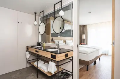 Ein Bett oder Betten in einem Zimmer der Unterkunft aja Garmisch-Partenkirchen