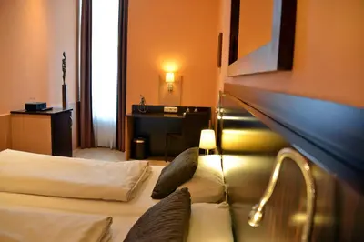 Ein Bett oder Betten in einem Zimmer der Unterkunft Arthotel Munich