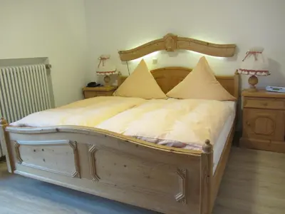 Ein Bett oder Betten in einem Zimmer der Unterkunft Hotel-Pension-Ostler