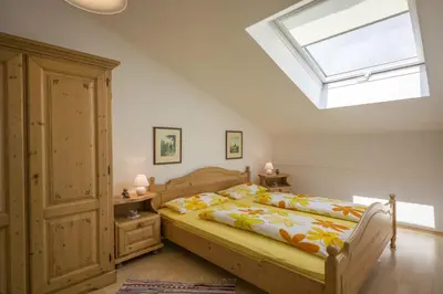 Ein Bett oder Betten in einem Zimmer der Unterkunft 3 Sterne Komfortable Ferienwohnung mit einem Traum Blick zu den Bergen Sauna Spielzimmer Küche Garage 27