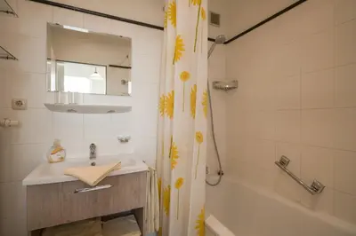Ein Badezimmer in der Unterkunft 3 Sterne Komfortable Ferienwohnung mit einem Traum Blick zu den Bergen Sauna Spielzimmer Küche Garage 27