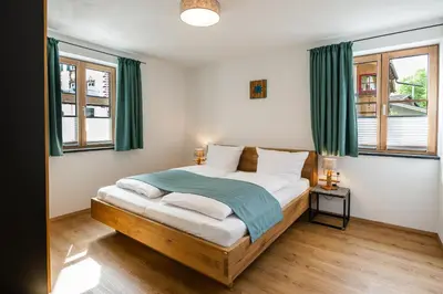 Ein Bett oder Betten in einem Zimmer der Unterkunft Ferienwohnungen Zober am Mühlbach