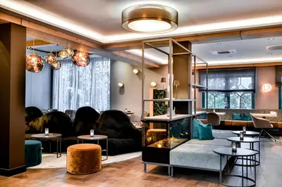 Ein Sitzbereich in der Unterkunft Boutique Hotel Erb München Parsdorf
