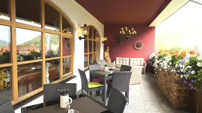 Ein Sitzbereich in der Unterkunft Hotel Blaue Gams ***S