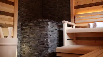 Ein Bett oder Betten in einem Zimmer der Unterkunft Hotel Blaue Gams ***S