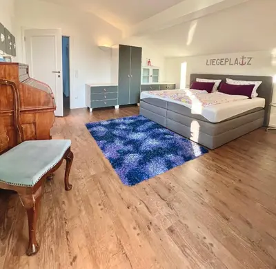 Ein Bett oder Betten in einem Zimmer der Unterkunft Auszeit im Chiemgau, Ferienwohnungen
