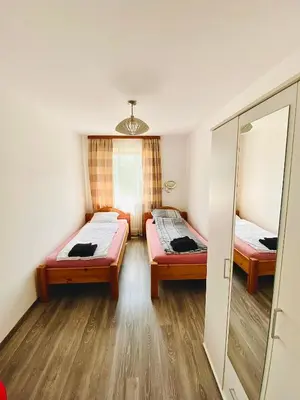 Ein Bett oder Betten in einem Zimmer der Unterkunft Charmante 3Zi-Ferienwohnung im Landhausstil