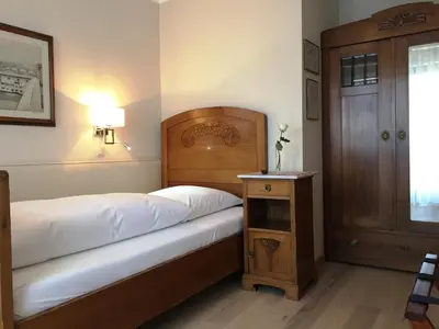 Ein Bett oder Betten in einem Zimmer der Unterkunft Hotel Sollner Hof