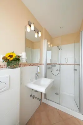 Ein Badezimmer in der Unterkunft Hotel Sollner Hof