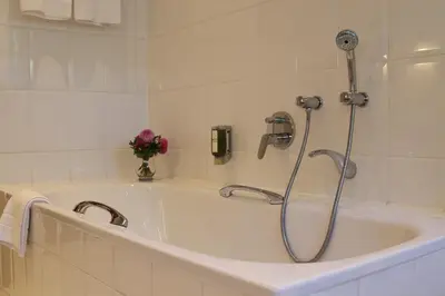 Ein Badezimmer in der Unterkunft Hotel Sollner Hof