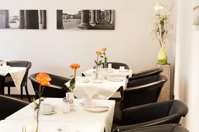 Ein Sitzbereich in der Unterkunft Hotel Sollner Hof
