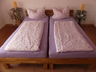 Ein Bett oder Betten in einem Zimmer der Unterkunft Ferienwohnung Bergblick
