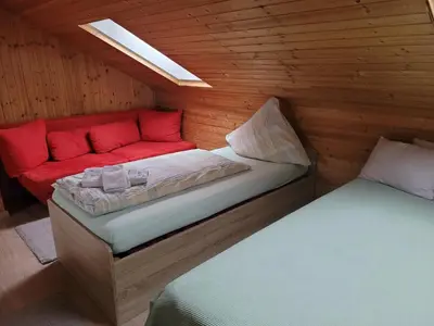 Ein Bett oder Betten in einem Zimmer der Unterkunft Pension Schlafstuhl