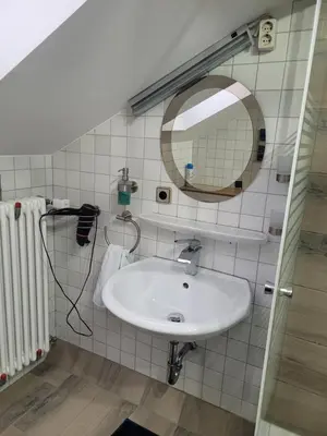Ein Badezimmer in der Unterkunft Pension Schlafstuhl