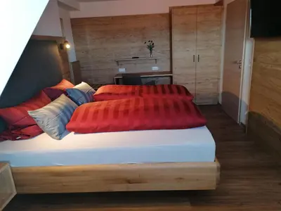 Ein Bett oder Betten in einem Zimmer der Unterkunft Pension zum Bären