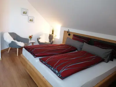 Ein Bett oder Betten in einem Zimmer der Unterkunft Pension zum Bären