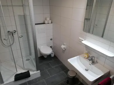Ein Badezimmer in der Unterkunft Pension zum Bären