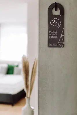 Ein Bett oder Betten in einem Zimmer der Unterkunft DAS STEIN