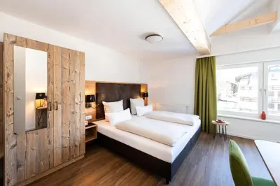 Ein Bett oder Betten in einem Zimmer der Unterkunft Schnitzers Dahoam - Hundefreundlich