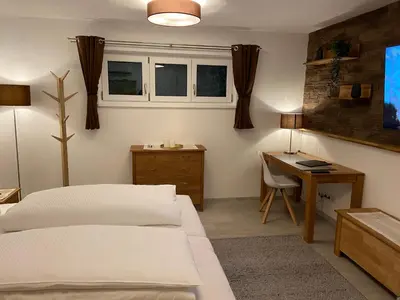 Ein Bett oder Betten in einem Zimmer der Unterkunft Haus Langweid