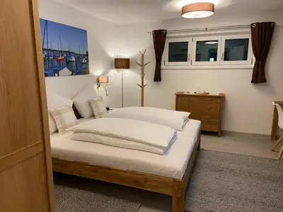 Ein Bett oder Betten in einem Zimmer der Unterkunft Haus Langweid