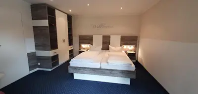 Ein Bett oder Betten in einem Zimmer der Unterkunft Central Hotel-Apart München
