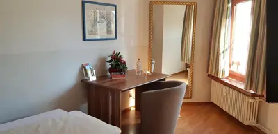 Ein Bett oder Betten in einem Zimmer der Unterkunft Central Hotel-Apart München