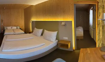 Ein Bett oder Betten in einem Zimmer der Unterkunft Ökohotel aus Holz Alea Eco