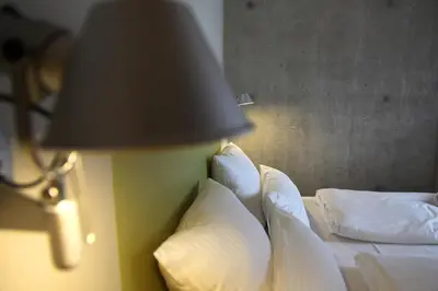 Ein Bett oder Betten in einem Zimmer der Unterkunft Ökohotel aus Holz Alea Eco