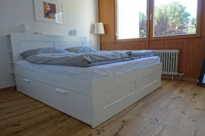 Ein Bett oder Betten in einem Zimmer der Unterkunft Nemos Paradies - TOP Lage am See und Sbahn