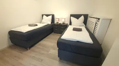 Ein Bett oder Betten in einem Zimmer der Unterkunft Neuburg City Apartments