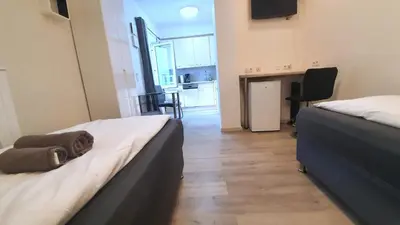 Ein Bett oder Betten in einem Zimmer der Unterkunft Neuburg City Apartments