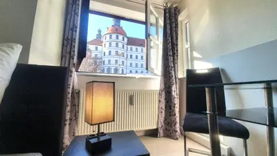 Ein Bett oder Betten in einem Zimmer der Unterkunft Neuburg City Apartments
