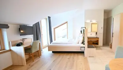 Ein Bett oder Betten in einem Zimmer der Unterkunft Danner-Hof