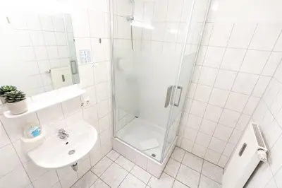 Ein Badezimmer in der Unterkunft Hotel Fresh INN