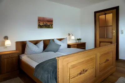 Ein Bett oder Betten in einem Zimmer der Unterkunft Schliersberg Alm