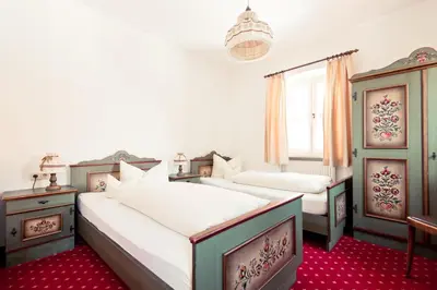 Ein Bett oder Betten in einem Zimmer der Unterkunft Schweiger's Landgasthof