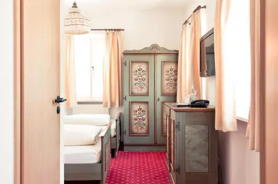 Ein Bett oder Betten in einem Zimmer der Unterkunft Schweiger's Landgasthof