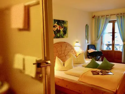 Ein Bett oder Betten in einem Zimmer der Unterkunft Hotel Waltraud Garni