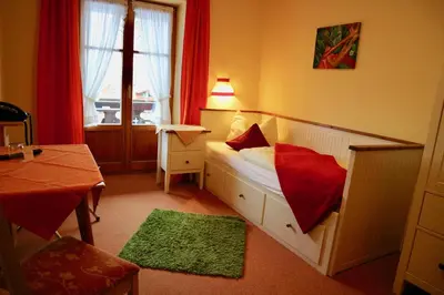 Ein Bett oder Betten in einem Zimmer der Unterkunft Hotel Waltraud Garni